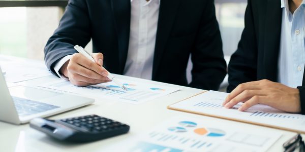 Young startup businessmen teamwork brainstorming meeting to discuss the new project investment.